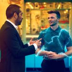 Apprentice talking with a colleague