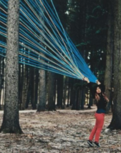 artwork of a woman in a forest